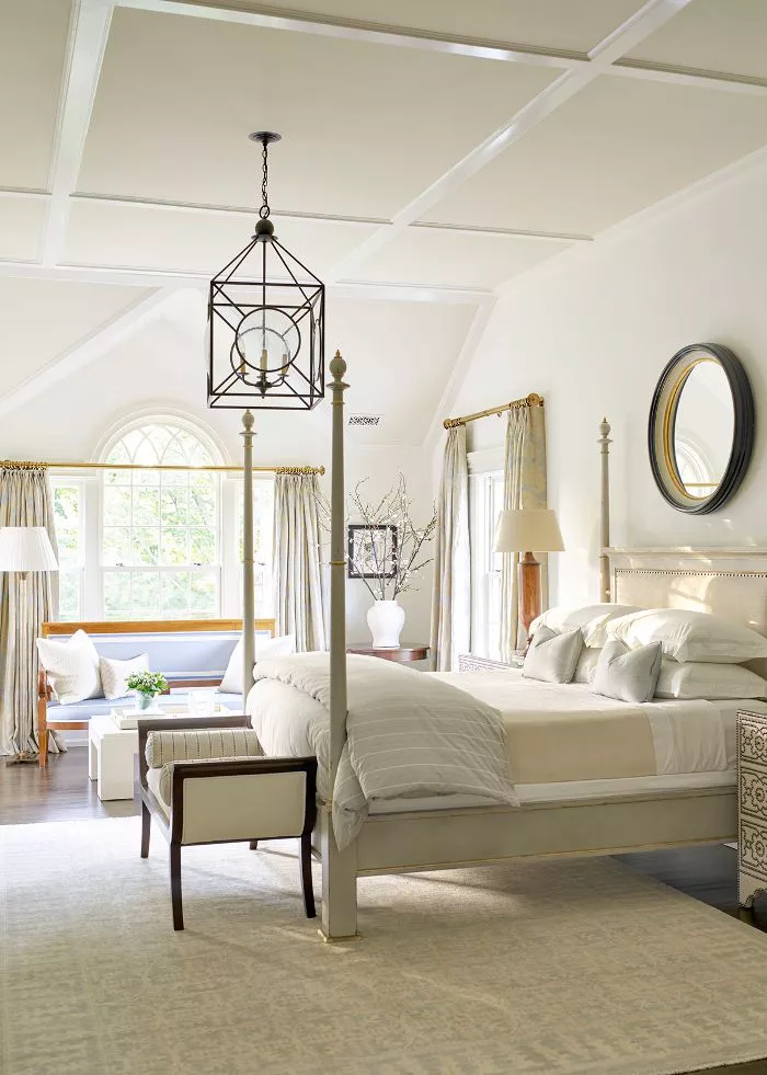Modern Traditional interior design bedroom with cream bedding and ivory walls